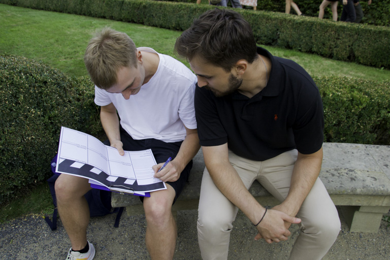 Employees writing a storyboard for Corporate Movie Making Team Challenge